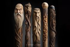 five carved wooden canes with faces and beards in different styles, all lined up against a black background