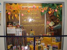 a display window with books and decorations on it