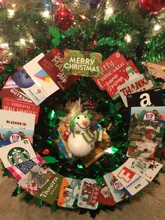 a christmas wreath made out of starbucks cards