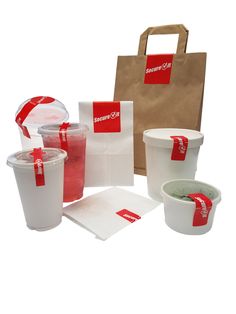 the contents of a paper bag and some cups