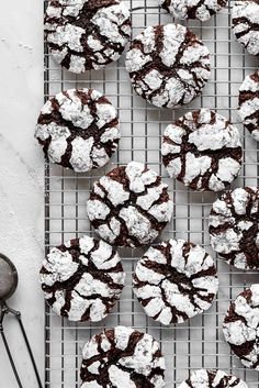 chocolate crinkle cookies cooling on a wire rack