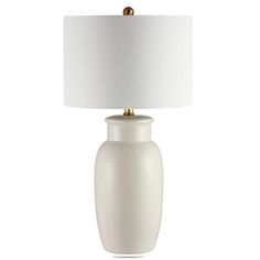 a white table lamp with a white shade on the base and a gold - plated metal base