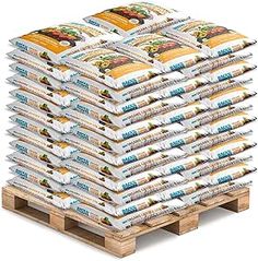 a stack of food sitting on top of wooden pallets in front of a white background