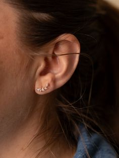 These petite ear climber earrings feature the tiniest crystal stones for a subtle added sparkle. Materials: 14k gold plate, Swarovski crystals Padgett Hoke is a jeweler based in Jackson Hole, Wyoming. Her delicate designs capture the spirit of the best parts of the great outdoors and being in the mountains. 2nd Piercing, Ear Climber Earrings, Ear Climbers Earrings, Ear Crawlers, Ski Girl, Ear Climber, Jackson Hole Wyoming, Curated Gift Boxes, Ear Climbers