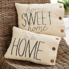 two pillows that say home sweet home and we'll be home on the same pillow