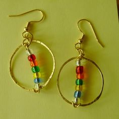 Earrings Colorful Hand Tooled Hammered Glass by GypsythatIwas, $12.00 Rainbow Metal Earrings With Ear Wire, Handmade Round Rainbow Earrings, Handmade Rainbow Round Earrings, Rainbow Metal Earrings, Adjustable Round Rainbow Earrings, Rainbow Round Bead Earrings For Pierced Ears, Spring Things, Earrings Bead, Earrings Colorful