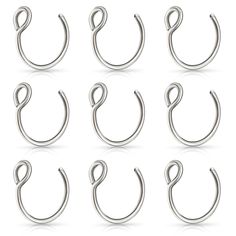 a set of silver metal hooks on a white background