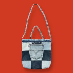 Handmade Denim Tote Bag Patchwork Mini Bag Upcycled Blue Jeans Vtg Retro 3x10x12 Handmade by me! Made out of recycled fabric scraps from denim jeans and the lining is fabric scraps from the 90s. Has a really nice frayed/distressed look thats's all natural too! Inside does not have pockets but there is a pocket on each side outside. Size measures 3x10x12 inches. Please refer to measurements for accurate fit. See Photos. *Some Colors/Shades May Vary Slightly Due To Screen Settings/Etc. Photos Take Denim Patchwork Bag, Colors Shades, Work Tote Bag, Jean Vintage, Denim Tote Bags, Upcycle Jeans, Work Tote, Denim Tote, Denim Patches