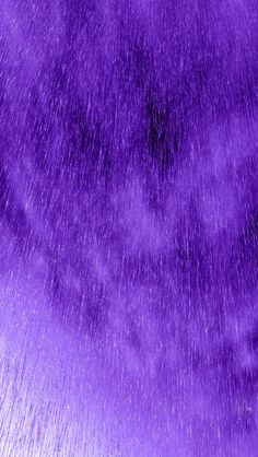 an abstract purple background with lots of water droplets