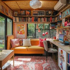 a living room filled with lots of furniture and bookshelves next to a window