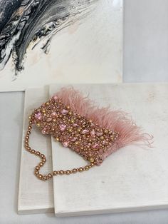 "Vintage-looking luxury rose gold wedding clutch is handmade and decorated with pink rhinestones, crystals, pearl beads, and cute ostrich feathers. The glamorous small bridal handbag on beaded strap will be a great addition to your amazing look on the Special Day! The tiny elegant evening bag has a fold-over cover and closes with a magnetic clasp. The fancy pink women purse will be a lovely accessory not only for the bride but also will suit the bridesmaids' outfit, Mom, or Mother-in-law festive Diy Clutch Purse, Fancy Clutch Purse, Bridal Handbag, Rose Gold Clutch, Pink Clutch Bag, Bridesmaid Clutch, Rose Gold Lace, Hot Pink Weddings