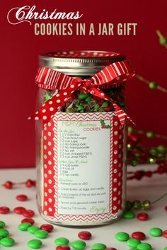 a jar filled with christmas cookies in a jar