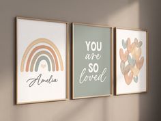 three framed art prints with the words you are so loved and rainbow in different colors