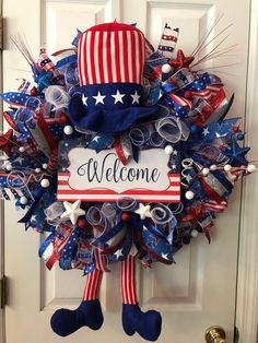 a welcome wreath with an american flag theme