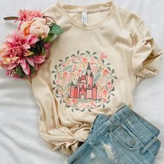 Cinderella's Castle Garden T-Shirt Floral Spring Disney Short-Sleeve Unisex T-Shirt. Disney inspired shirts for a Disney Vacation. @polkadotpixieshop Disney Cotton T-shirt For Spring, Disney Cotton Tops For Spring, Spring Disney Style Short Sleeve Tops, Disney Character Print T-shirt For Spring, White Disney T-shirt For Spring, Disney Crew Neck Tops For Spring, Disney Attire, Kinds Of Flowers, Castle Disney