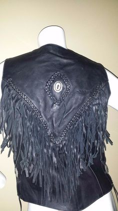 Here is a beautiful Preowned Black Leather Vest~ Measurements~ Armpit to Armpit 19" Length 21 1/4" No Scratches or gauges~nice condition Please see all photos Leather Fringe Vest, Black Leather Vest, Fringe Vest, Leather Vest, Leather Fringe, Ruffle Blouse, Black Leather, Leather, Women's Top