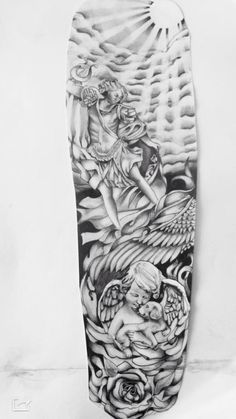 a black and white photo of an artistic tattoo design on the back of a man's leg