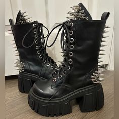 Please Note: One Of The Boots Has Some Indents From The Spikes Along The Inside, Shown In Pics These Combat Boots Have A Vegan Leather Construction, Spiked Stud Hardware All Over, Adjustable Lace-Up Ties, Pull Loops, Molded Chunky Platform And Block Heels, And Side Zip Closures. Spiky Boots, Spiked Platform Boots, Trendy Lace-up Boots With Spikes, Alternative Lace-up Boots With Spikes, Punk Lace-up Boots With Spikes, Black Lace-up Platform Boots With Spikes, Black Lace-up Moto Boots With Spikes, Doc Martins Boots, Dolls Kill Shoes