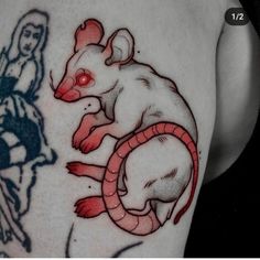 a tattoo with a rat on it and a woman riding a bike in the background