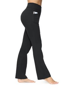 a woman in black yoga pants with her legs crossed and one leg bent up, looking down