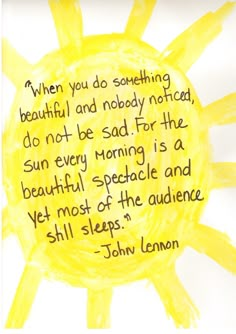 john lennon quote on sun with yellow watercolors and black ink in the center