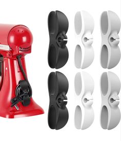 a red and white stand mixer next to four different attachments for the attachment on each side