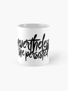 a white coffee mug with black lettering on it