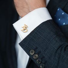 Product Description: These 18K gold plated initial cufflinks are the perfect custom gift for the groom/groomsmen or a thoughtful gesture to propose to the bride. Handcrafted with impeccable craftsmanship, these cufflinks make a statement on any important occasion. These cufflinks are perfect for weddings, best man proposals, or any special occasion where you want to make a stylish statement. They can be paired with a suit, tuxedo, or formal attire to add a touch of elegance and personality to an Classic Gold Cufflinks For Wedding, Gold Cufflinks For Groom, Gold Elegant Cufflinks For Groom, Elegant Gold Cufflinks For Grooms, Elegant Gold Cufflinks For Groom, Gold Jewelry For Father's Day Formal Events, Classic Gold Wedding Cufflinks, Gold Jewelry For Formal Father's Day Celebration, Gold Jewelry For Formal Occasions On Father's Day