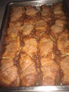 a pan filled with food sitting on top of a counter