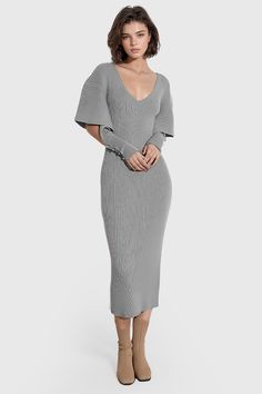 The V Neck Ribbed Midi Dress is a stylish piece with its deep V-neck and ruffled sleeves. The dress has a bodycon fit and is knee-length, making it perfect for a variety of occasions. The vertical ribbed pattern throughout the dress adds a touch of sophistication, while the short, ruffled sleeves provide a feminine charm.Fabric: Cotton, Polyester Grey Midi Dress, Ribbed Midi Dress, Ruffled Sleeves, Gray Dress, Deep V Neck, Women Empowerment, Knee Length, The Dress, Active Wear