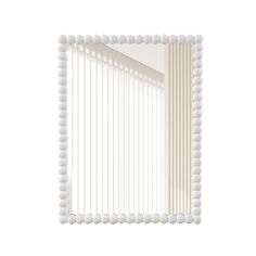 a mirror with white beads hanging on it's side