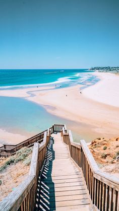 stairs lead down to the beach and water