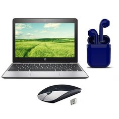 an open laptop computer sitting on top of a desk next to a mouse and headphones