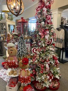 a christmas tree decorated with red and white ornaments