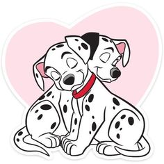 two dalmatian puppies sitting next to each other on a heart shaped background