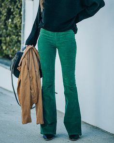 True to Size 97% Cotton and 3% Spandex Hand Wash Cold. Dry Flat High Rise Elastic Waistband Wide Pant Leg Corduroy Fabrication No Closures Not Lined Corduroy pants deliver such a fall vibe! Our Sophie High Rise Bell Bottom Corduroy Pants come in a green hue. Designed with bell bottoms and a high rise waist. Finished with an elastic waistband. Styled with the Chloe Mini Necklace. Compass Coin Necklace. Simple Bangle Bracelet. Highland Bag. Market Jacket. This Time Around Ribbed Dolman Sweater. an Full Length Green Pants For Fall, Green Full-length Bottoms For Fall, Green Full Length Bottoms For Fall, Trendy Solid Color Corduroy Bottoms, Fitted Corduroy Pants For Winter, Winter Fitted Corduroy Pants, Green Fitted Corduroy Bottoms, Green Corduroy Bottoms For Fall, Fitted Green Corduroy Bottoms