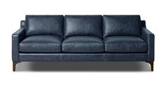 a blue leather couch on a white background