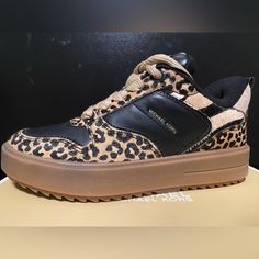 Size 6. Nice Casual Sneaker- Received For A Christmas Gift, Tried On Inside, But Not My Style. Come In Original Packaging And Box. Firm On Price. Michael Kors Shoes, Michael Kors Black, Casual Sneakers, Womens Shoes Sneakers, Womens Sneakers, Black And Brown, Leopard Print, Christmas Gift, Shoes Sneakers