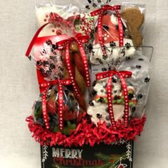 a christmas gift basket with teddy bears and cookies in it for someone's special occasion