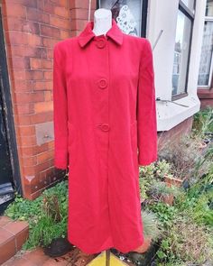 Stunning 1940s bright red wool coat lined fab fabric covered buttons so stylish and such a classic timeless design  Bust 48 inches Waist 48 inches Hips 50 inches Total length 43 inches Condition  In good condition minor wear Classic Red Long Wool Coat, Classic Red Wool Coat, Formal Red Wool Coat, Long Red Outerwear With Buttons, Red Long Outerwear With Buttons, Red Long Wool Coat With Buttons, Red Wool Coat, Fabric Covered Button, Red Wool