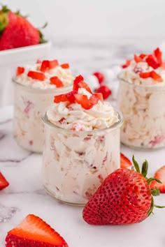 raspberry trifle with whipped cream and fresh raspberries on the side