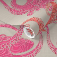 a pink and white wallpaper with an intricate design on the back half of it