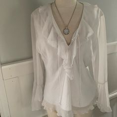 Vintage Y2k Silky White Fitted Blouse. Never Worn! (Measurements Included In Info) Delicately Patterned With A Subtle And Classy Design In White Complimenting The Bright White Layered Blouse With Flowing Bell Sleeves And Fitted At Waist. Gorgeous And Flowy Bell Style Sleeves. Very Silky Feel And So Airy And Comfortable While Keeping Everything Hidden Despite White Color. So Soft And Feminine. Very Current And Trendy. Size Medium But Can Fit Small As It’s Vintage. Perfect Day To Night Wear! Great Flowy Top Aesthetic, White Victorian Blouse, Flowy Sleeves Top, White Ruffled Blouse, White Vampire Outfit, White Blouse Aesthetic, Blouse Outfit Aesthetic, White Blouse Outfit Classy, White Pirate Shirt