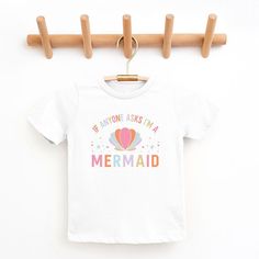 Looking for a cute tee for your kids? We have the perfect I'm A Mermaid graphic tee addition to their closet! Also available in toddler tees. Mermaid Graphic, Mermaid Cartoon, Trending Graphic Tees, Watercolor Mermaid, Minnie Mouse Bow, Bow Shorts, Minnie Mouse Girl, Ariel The Little Mermaid, Top Graphic Tees