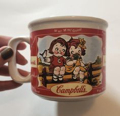 This a vintage ceramic Campbell's soup mug. It is in good pre-owned vintage condition; no chips/cracks (see photos). It measures approximately 3.5 inches tall, 5 inches across from edge to handle, and 4 inches around. Feel free to contact me with any questions. Thank you! Campbells Soup, Campbell Soup, Soup Mugs, Just Girly Things, Vintage Ceramic, Girly Things, Thrift Store, Barware, Kitchen Dining