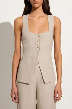 The Maya Vest in Natural offers a feminine and modern take on the classic vest style. Cut from 100% linen fibres in its natural and undyed form, it features a square neckline, four-button front closure, open front hem and a back waist tie for a custom fit. Pair it with the Isotta Pant for a tailored two-piece set. Áo Blu, Vest Style, Linen Fashion, Linen Style, Faithfull The Brand, Vest Fashion, Shop Maxi Dresses, Linen Women, Vest Top