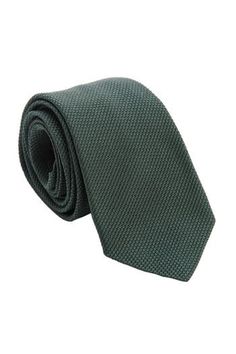 Embrace classic elegance with this forest green grenadine tie that will give your look understated sophistication and will make a lasting impression. Standard Length: Approx. 3.25" x 58.5". A classic tie width and length that is perfect for most men up to 6'2". 100% silk grenadine garza fina: Garza fina (fine gauze) is a loose weave fabric made from high-twist yarns. It has a slightly knobby texture. Tipped with our signature pinstripe silk: Not only is it a refined finishing touch, it keeps you Suits With Green Ties, Classic Green Ties For Formal Occasions, Elegant Green Ties For Work, Elegant Green Tie For Work, Classic Green Ties For Black Tie Occasions, Classic Green Suit And Tie Accessories, Classic Green Tie For Black Tie Occasions, Classic Green Suit And Tie Accessories For Semi-formal Occasions, Classic Green Ties For Black Tie Events