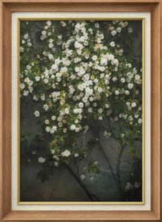 an oil painting of white flowers in a wooden frame on a wall with a black background