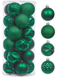 green christmas ornaments are in a clear box