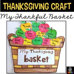 a basket filled with lots of apples sitting on top of a wooden sign that says, my thanksgiving basket